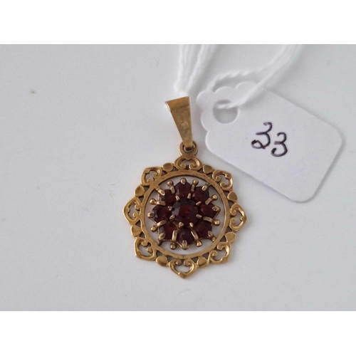 33 - A Garnet Cluster Pendant 9Ct 2.2 Gms