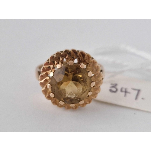 347 - A Yellow Stone Circular Dress Ring 9Ct Size P 5.4 Gms