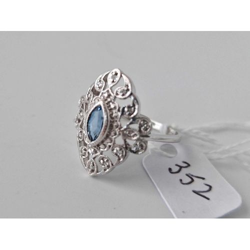 352 - A Fancy White Gold Marquise Ring With Central Blue Topaz Surrounded With Diamonds 9Ct Size S