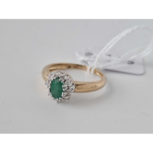 355 - A Emerald And Diamond Cluster Ring 9Ct Size M