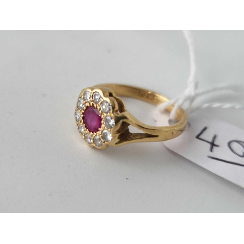 407 - A Ruby And Diamond Cluster Ring 18Ct Gold Size I 2.7 Gms