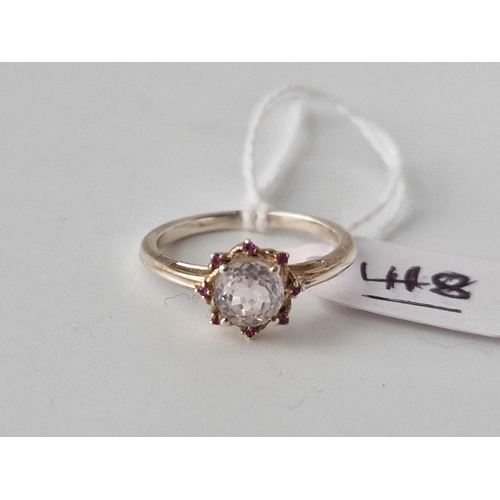 418 - A Silver And Rose Quartz And Ruby Ring Size O