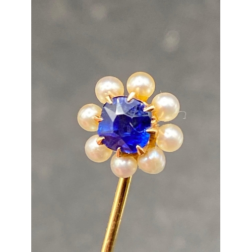 42 - A Victorian Sapphire And Pearl Stick Pin In High Carat Gold