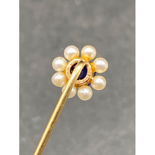 42 - A Victorian Sapphire And Pearl Stick Pin In High Carat Gold