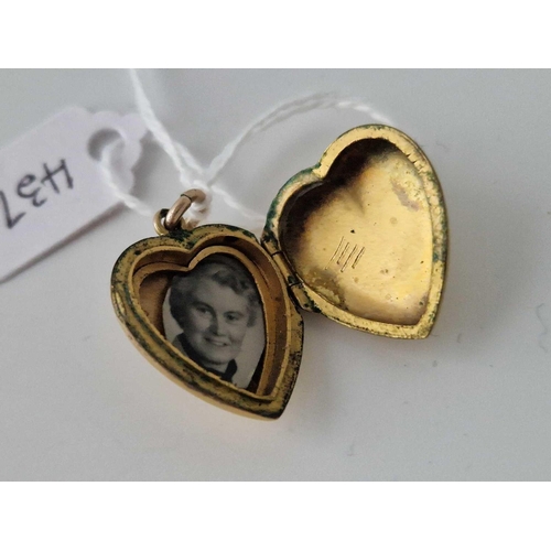 437 - A Gold Plated Heart Locket With Diamond And Red Stones