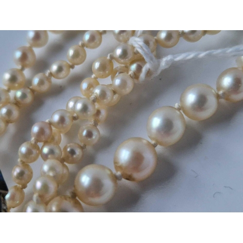 450 - A Double Row Pearl Necklace With White Gold Diamond Clasp 13 Inch