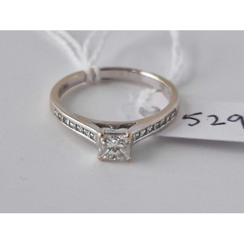 529 - A Quality Single Stone Princess Cut Diamond Ring With Diamond Set Shoulders 18Ct Gold The Princess C... 