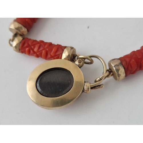 60 - A Victorian Carved Coral And Gold Bracelet With Padlock 6 Inch