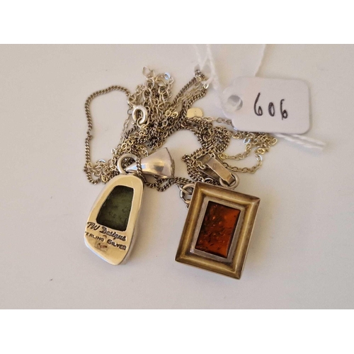 606 - A Silver Square Amber Pendant Necklace And Silver Designer Pendant Necklace