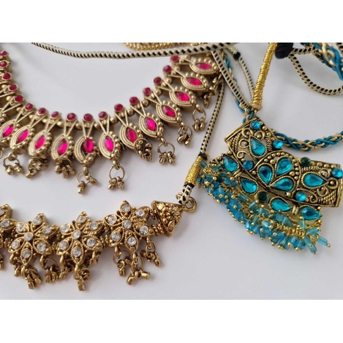 62 - Four Attractive Asian Costume Necklaces