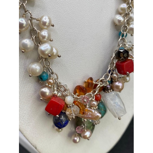 641 - A Silver Pearl And Multi Crystal Necklace 40 Gms