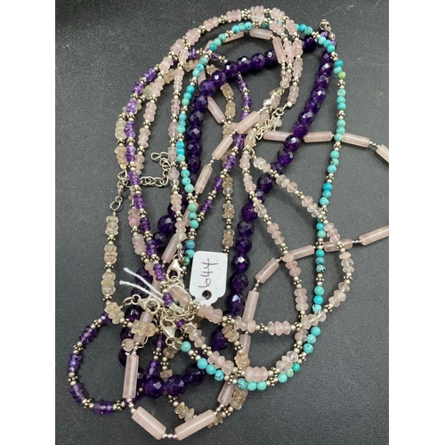 644 - A Bag Of Seven Silver And Gem Stone Necklaces With Amethyst Turquoise And Crystal Mounts 120 Gms