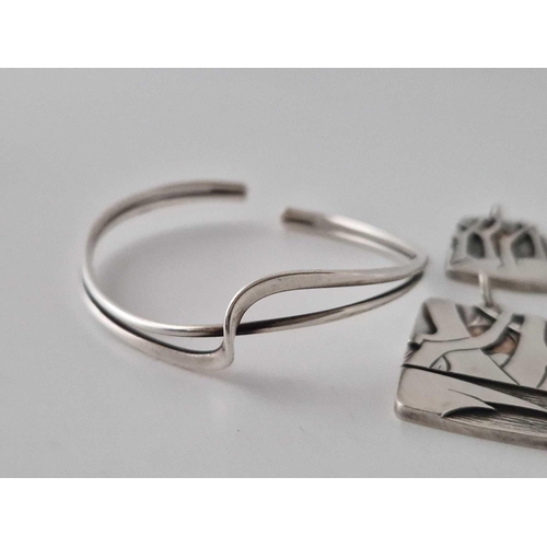 654 - Two Australian Silver Pendant And A Bangle