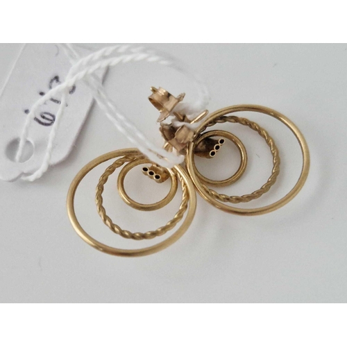 678 - A Pair Of Circular Earrings 9Ct 1.6 Gms