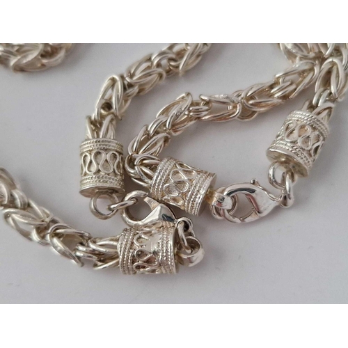 693 - A Fancy Silver Bracelet And Chains 52 Gms