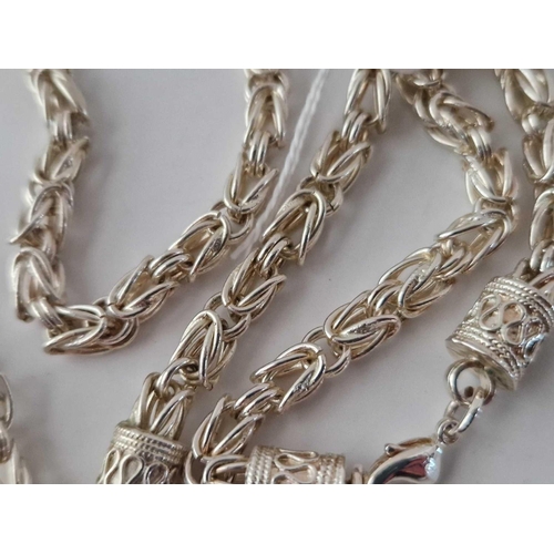 693 - A Fancy Silver Bracelet And Chains 52 Gms