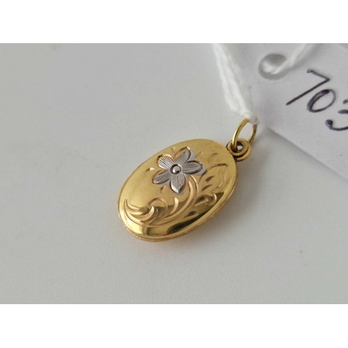 703 - A Sliding Locket Pendant 9Ct