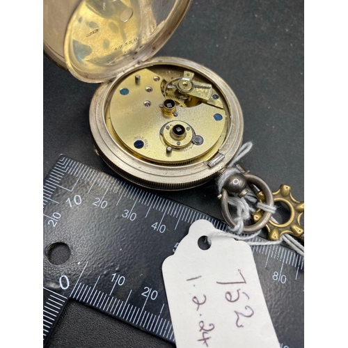 752 - A Gents Silver Pocket Watch With Seconds Dial And Key W/O