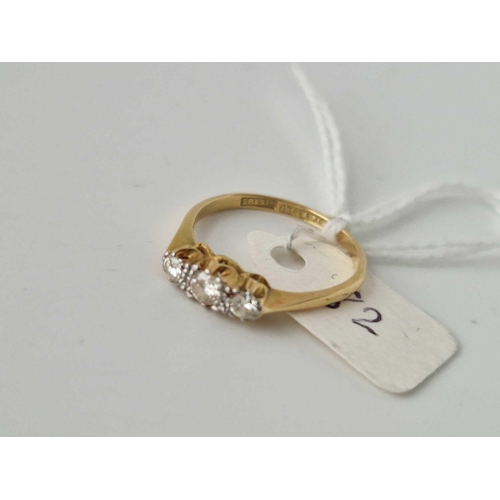 82 - A Three Stone Diamond Ring 18Ct Gold Size P 2.7 Gms