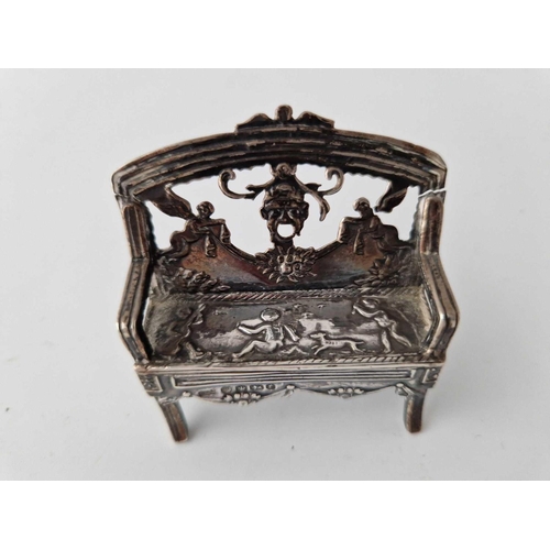 838 - A Miniature Sofa With Pierced Back, A Similar Display Cabinet And A Two Handled Vase, One Sheffield ... 