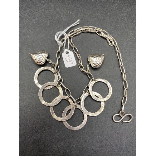 643 - A Vintage Designer Hammered Silver Hoops And Heart Necklace 42 Gms