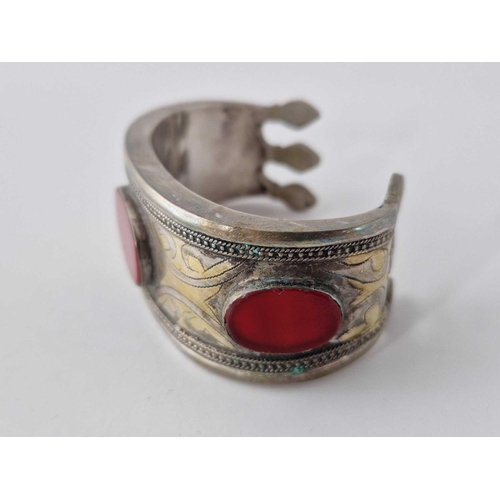 108 - A Antique Turkmen middle eastern silver cuff bracelet with carnelian stones and gold inlay 63g