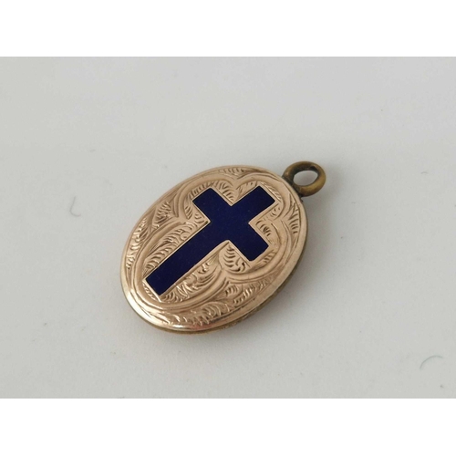 129 - A Victorian memorial gold back and front pendant with enamelled blue cross