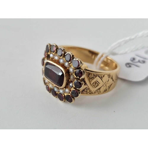 136 - A ANTIQUE BAND RING WITH GARNET AND PEARLS 22CT GOLD SIZE P 7.3 GMS