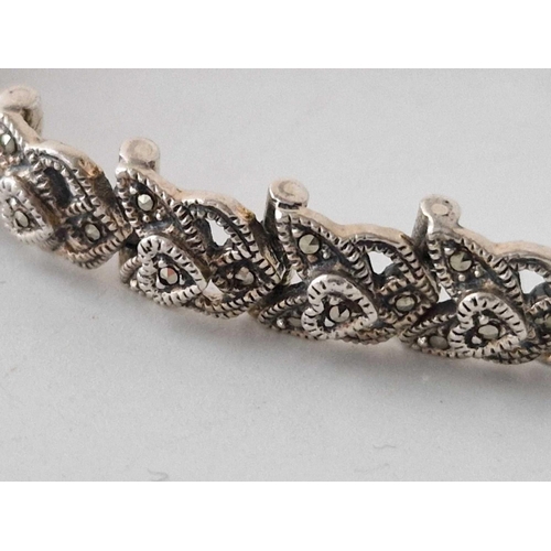 148 - a silver and marcasite bracelet, 7.5 inch, 30 g