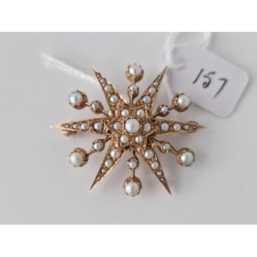 157 - A pearl star brooch 9ct 8.5 gms