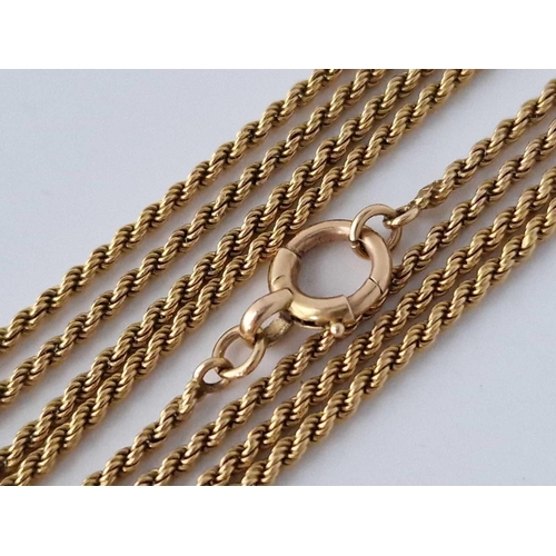 159 - A VERY LONG ROPE LINK GUARD CHAIN 15CT GOLD 58 INCH 22.4 GMS