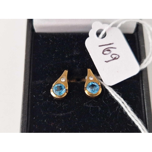 169 - A pair of diamond and topaz earrings 9ct 3 gms