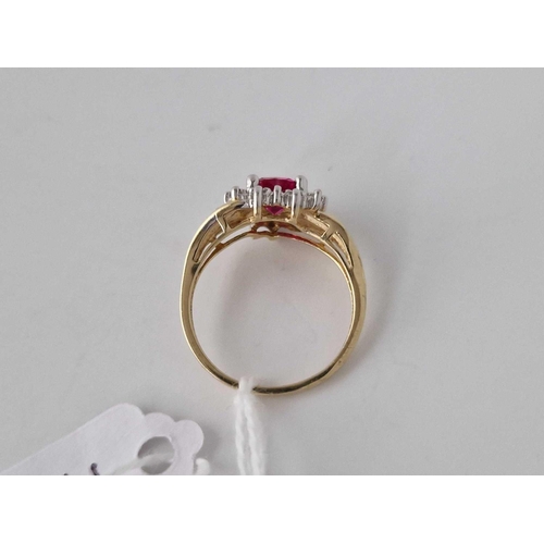 179 - A red stone and diamond heart shaped ring 9ct size N �  2.4 gms