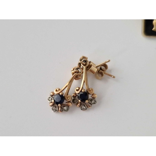 191 - A pair of silver cufflinks and one other and a pair of 9ct sapphire set earrings