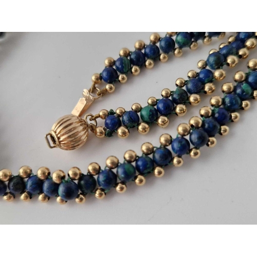 196 - A 14ct gold and lapis bead necklace 17 inch 12.1 gms