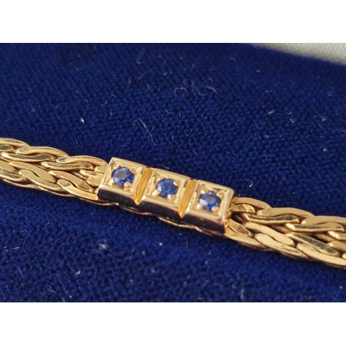 202 - A sapphire bracelet 9ct 7 inch 8.2 gms