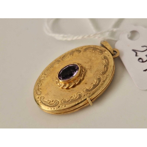 259 - An amethyst set locket, 9ct, 4 g