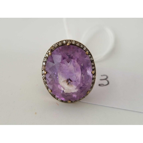 3 - An amethyst and diamond ring, set in gold, size N, 8.2 g