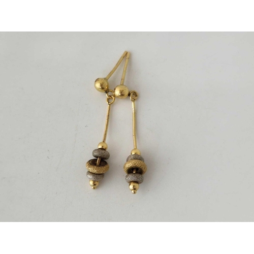 31 - A pair of 18ct gold ear drops 2.7 gms