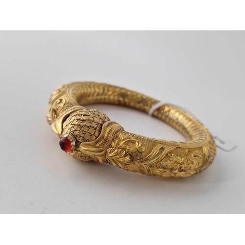 310 - A middle eastern gold gilt KADA hinged bracelet