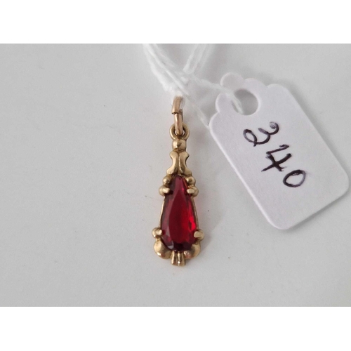 340 - A red stone pendant 9ct