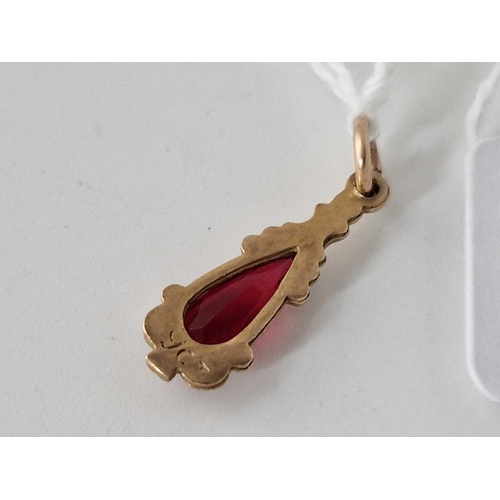 340 - A red stone pendant 9ct