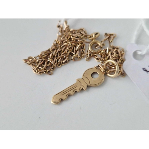 342 - A gold key pendant and neck chain 9ct 16 inch 2,4 gms