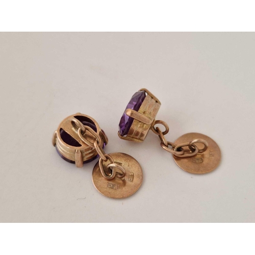 368 - A pair of purple stone cufflinks, 9ct, 9.4 g