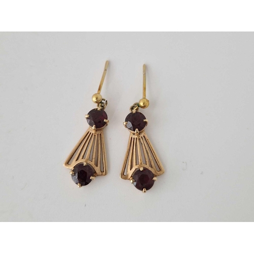 37 - A pair of garnet drop earrings 9ct 3.2 gms