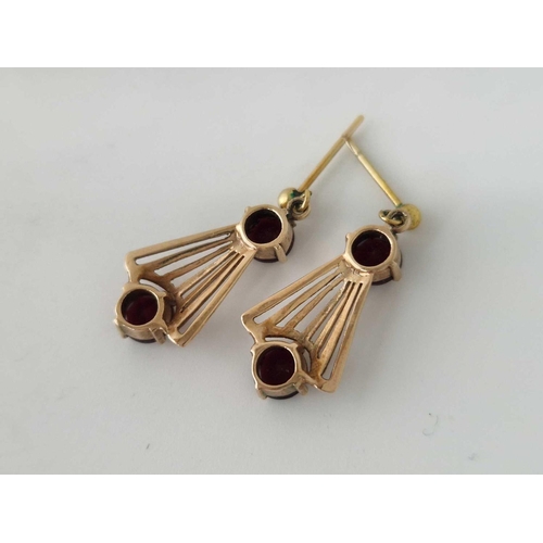 37 - A pair of garnet drop earrings 9ct 3.2 gms