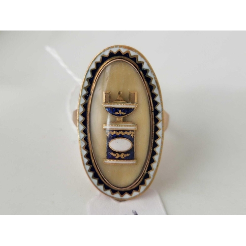 380 - A GOLD GEORGE III OVAL ENAMELLED MEMORIAL RING THE OTTER BOARDER WITH A BLUE AND WHITE ZIG ZAG PATTE... 