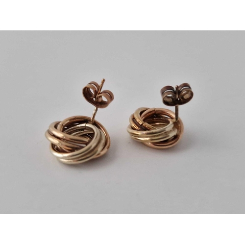 419 - A pair of two colour knot earrings, 9ct, 5.9 g