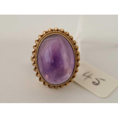 45 - An amethyst cabochon ring, 9ct, size K 1.5, 5.1 g