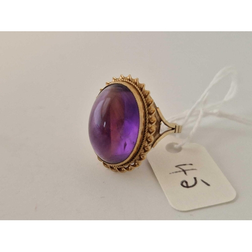 45 - An amethyst cabochon ring, 9ct, size K 1.5, 5.1 g